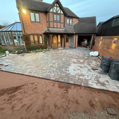 Tumbled block paving driveway being laid — one of our building and landscaping projects in Kingswinford