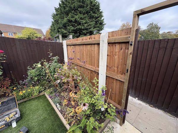 New timber fence panels and landscaped garden borders in Kingswinford